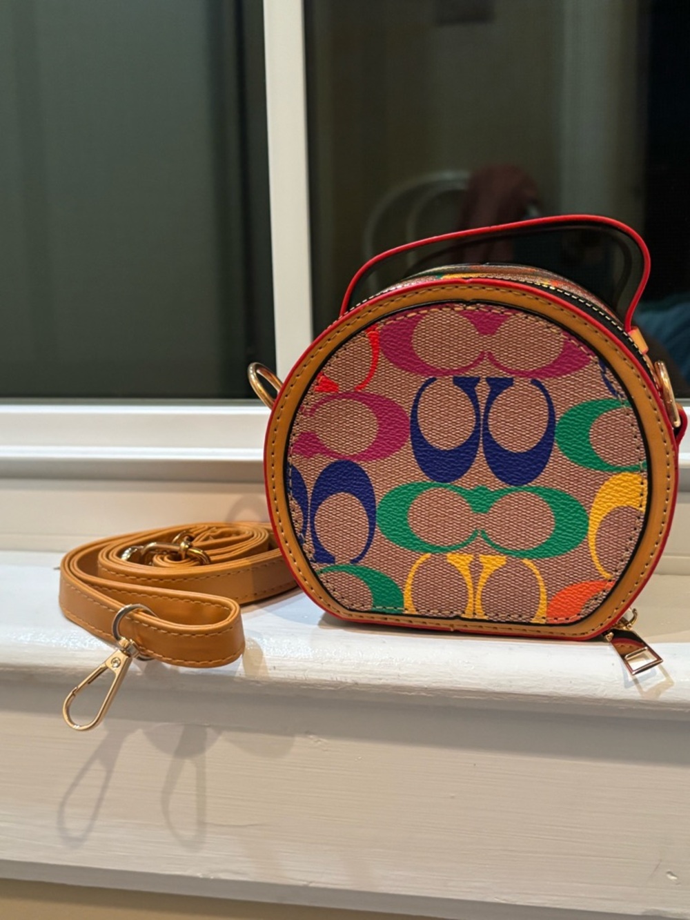 Multicolor Logo-Print Round Crossbody Bag - Picture 2 of 9